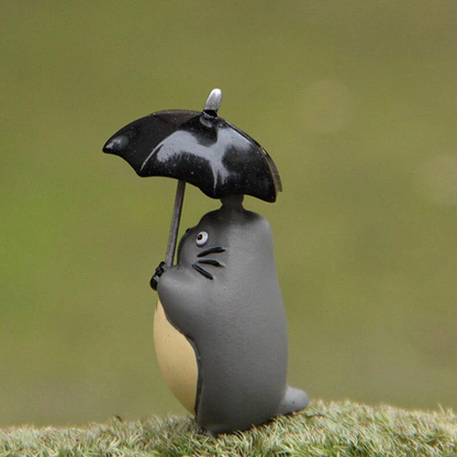 Miniaturfigur mit Regenschirm – Deko & Sammlerfigur